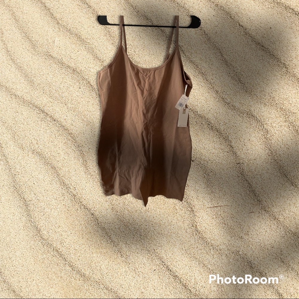 Beige nude one piece jumper size 6